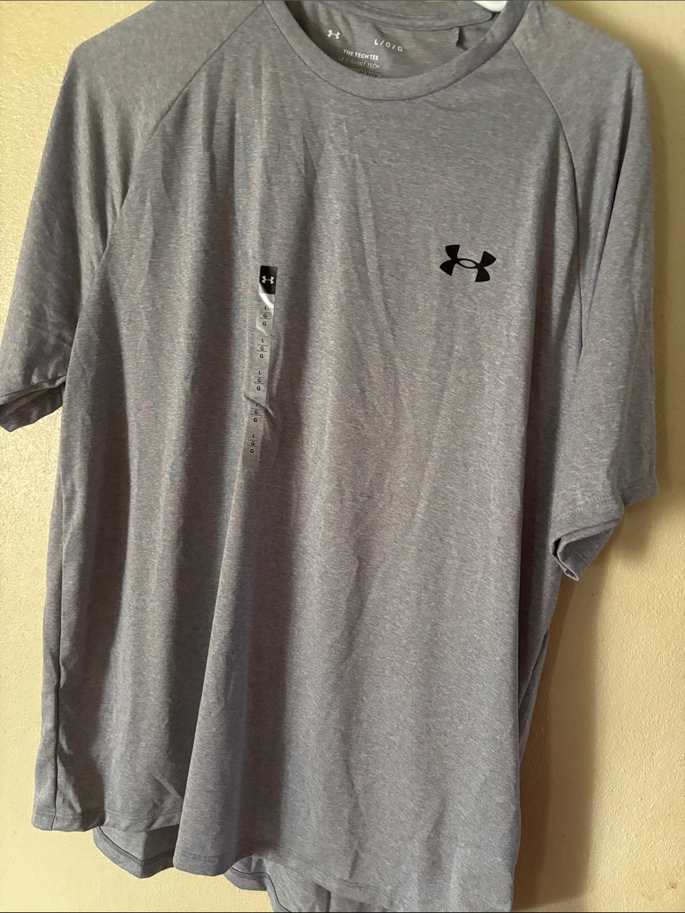 Under Armour Men’s Heather Gray Performance Tee with Black Logo
